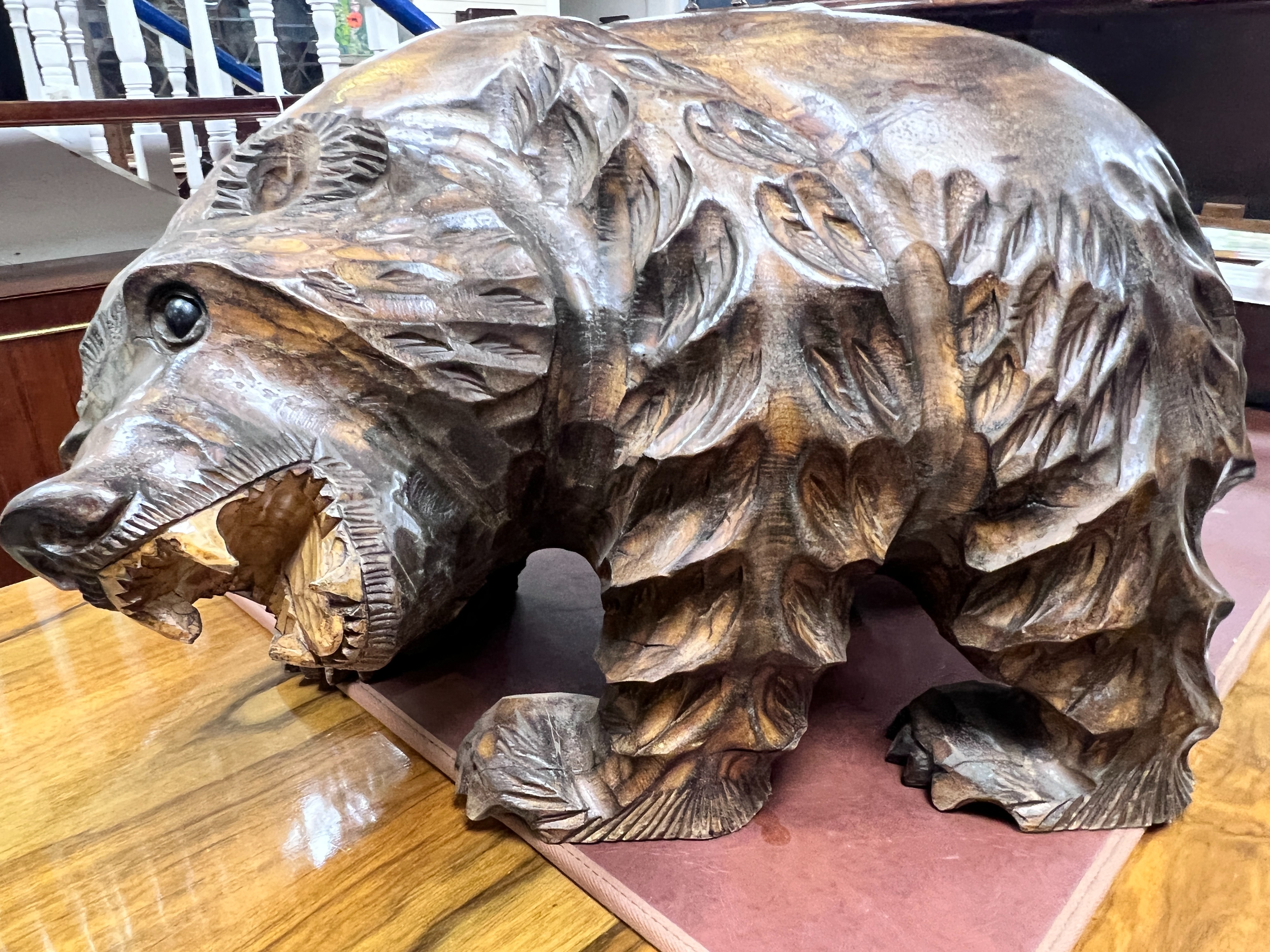 A large Japanese carved wood bear, 40 cms high